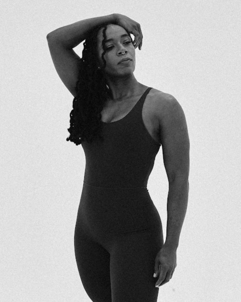Dr. Hope L. Hayes with one hand behind her head in a relaxed, approachable pose