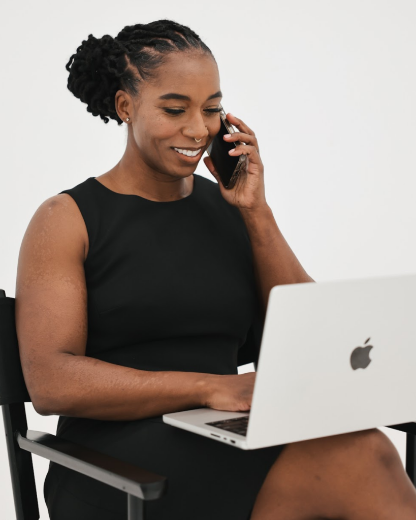 Dr. Hope L. Hayes smiling during an online pelvic floor therapy consultation, providing a supportive and reassuring presence